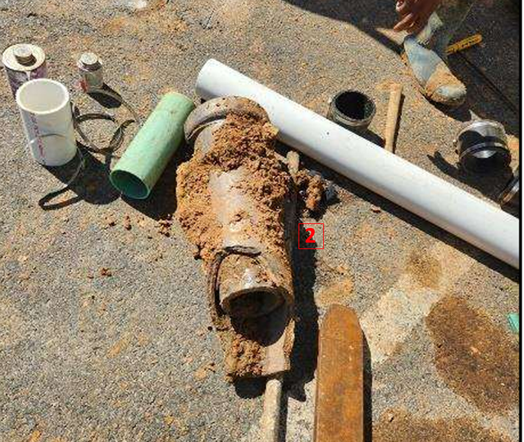 A broken pipe with dirt on the ground

AI-generated content may be incorrect.
